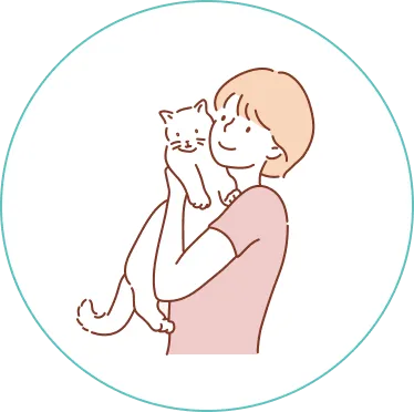 ネコを抱く女性